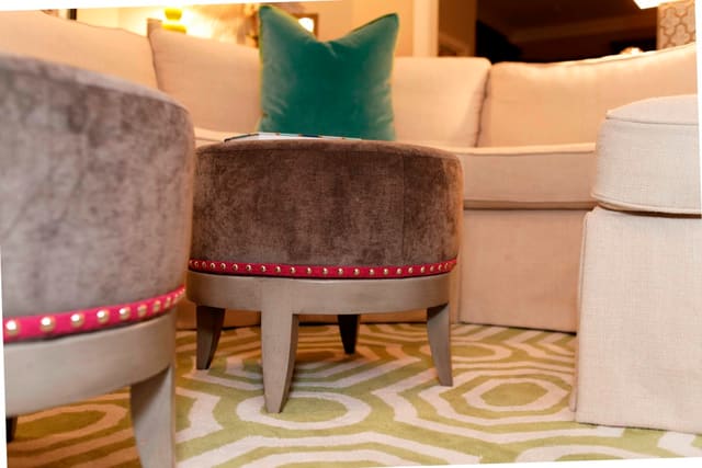 Green Area Rug with Twin Ottomans with Pink Tape Trim and Nailheads