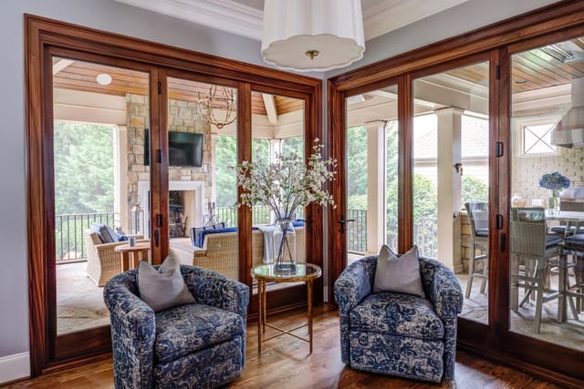 Two Hickory White swivel chairs facing into the kitchen.