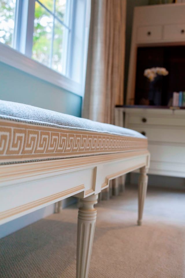 Close up of bedroom bench with greek key tape trim accent