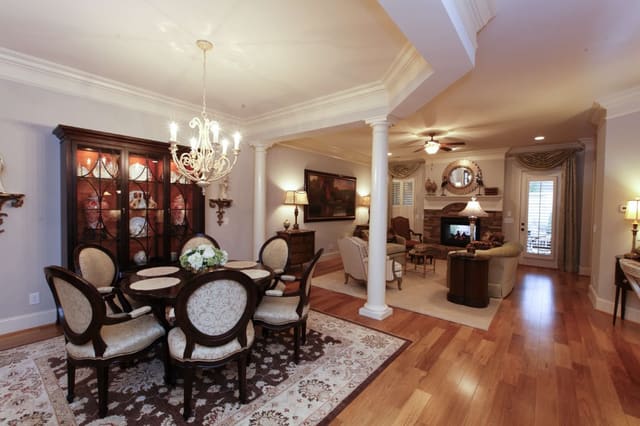 Dining Room looking into Living Room, china cabinet with colored interior