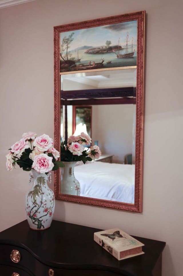 Mirrored artwork above chest