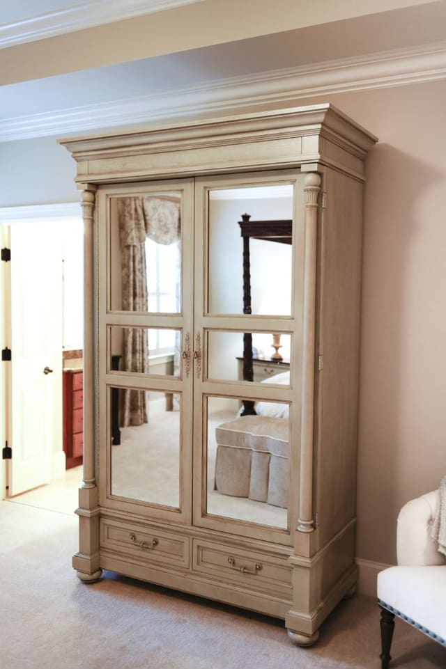Hickory Chair mirrored Armoire in Master Bedroom