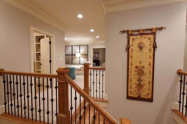 Tapestry design artwork hanging in stairway