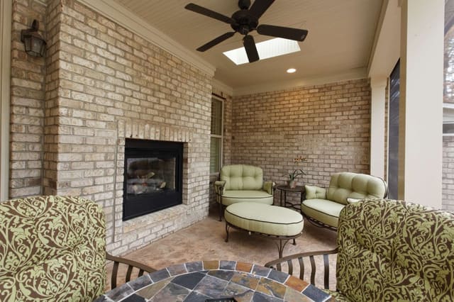 Back Patio with Outdoor Fireplace and Outdoor Furniture