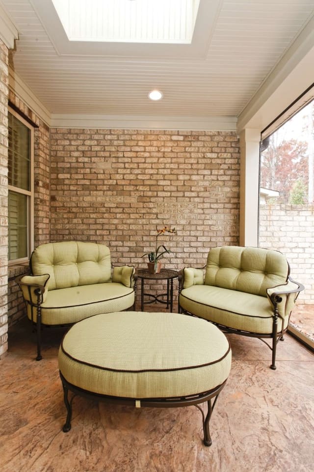 Back Patio with Outdoor Fireplace and Outdoor Furniture