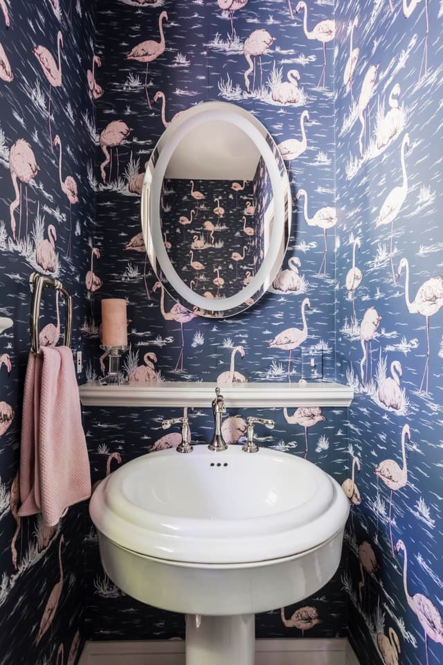Mud Room bathroom with fun flamingo wallpaper