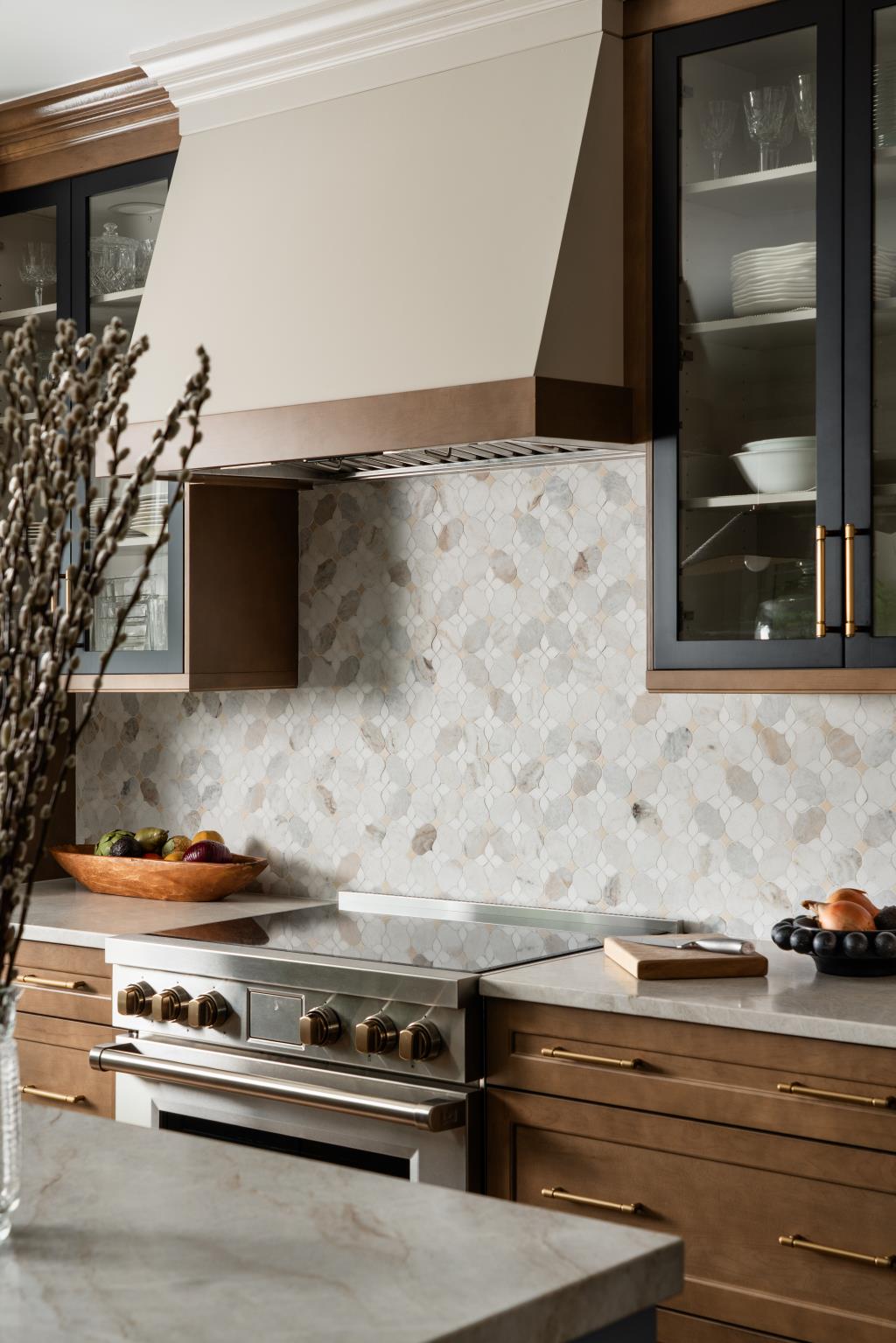Kitchen with textured natural tone backsplash