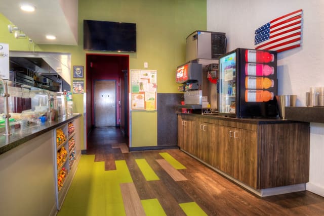 Interior of Diced Restaurant in Cary with colorful LVT Flooring