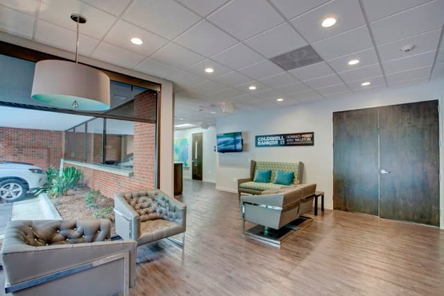 Office Lobby with sleek furniture in brown and turquoise hues