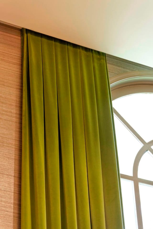 Close up of green velvet drapery panels at Paragon Bank