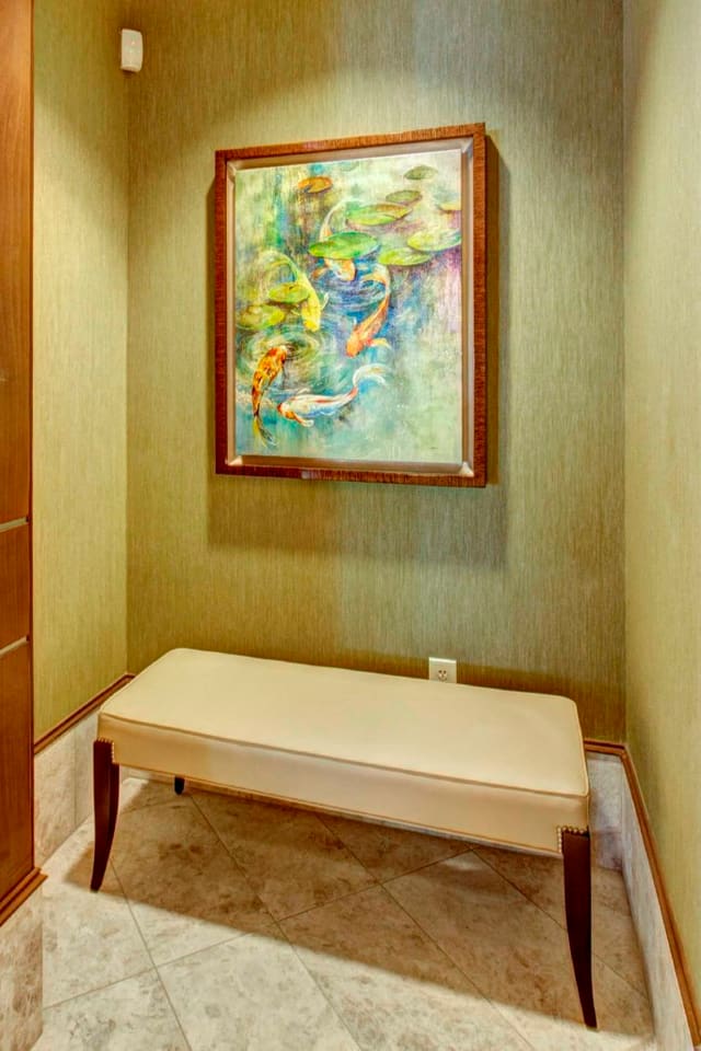 Leather bank and giclee artwork with wallpaper in Paragon Bank Lobby