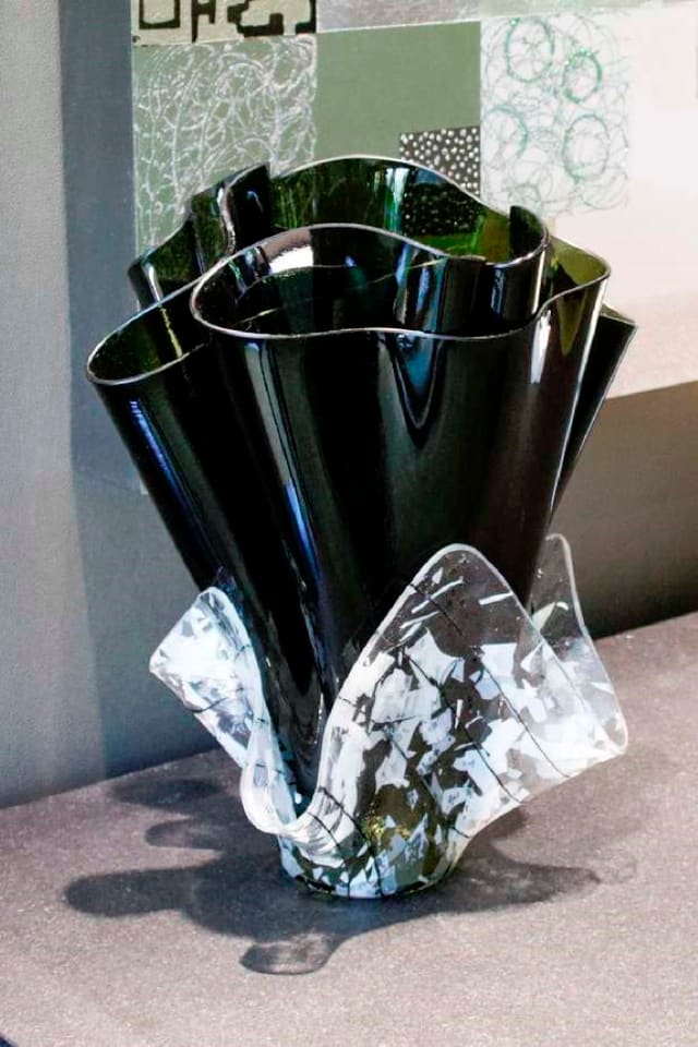 Custom glass vase in Paragon Bank Board room to coordinate with artwork colors