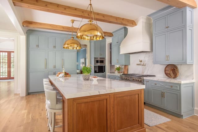 Kitchen with Marble Countertop and Backsplash