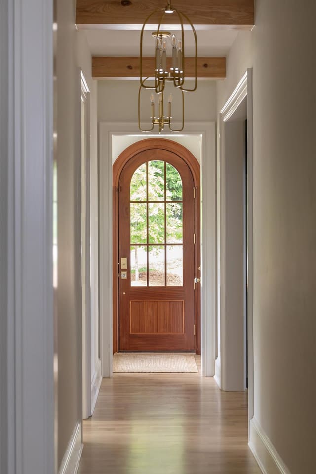 Hallway with Arch Top Door