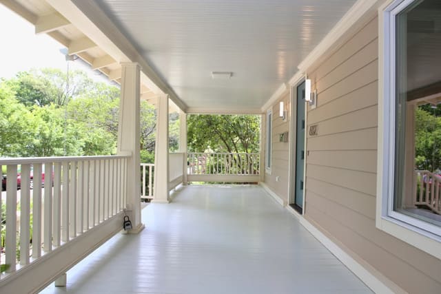 Front Porch of Downtown Raleigh Bungalow with blue painted floor and ceiling