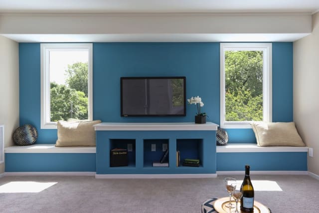 Bonus Room in Downtown Raleigh home with window seats and contrast blue wall