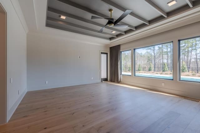 Master Bedroom with Ceiling Beams
