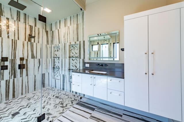 Master Bath with Black and White Abstract Pattern