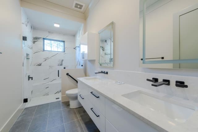 Guest Bath with Marble Double Sink Vanity