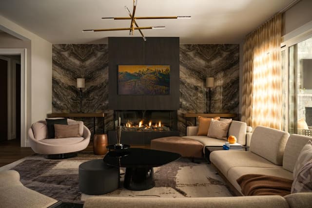 Living Room with Marble Accent Wall & Neutral Tones