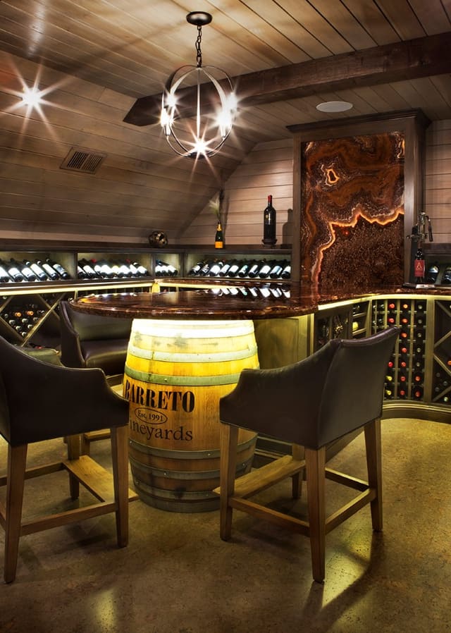 Wine Room converted from unfinished Attic Space with paneled ceiling,  and cork floor.