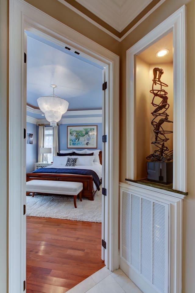 Entry to Master Bedroom showing niche with metal statue