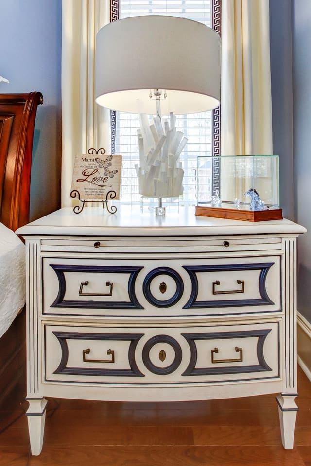 Custom painted nightstand with contrast blue striping