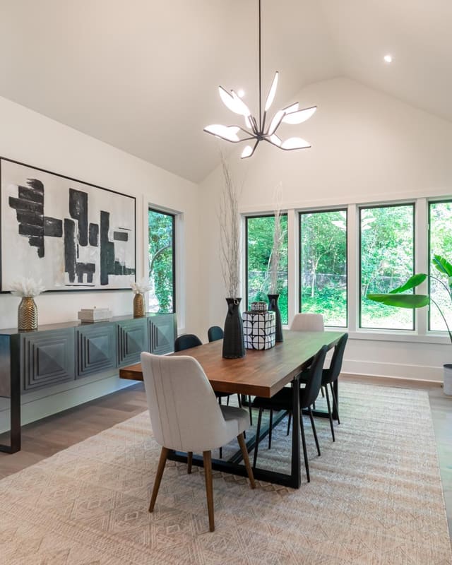 Staged dining room with modern decor.