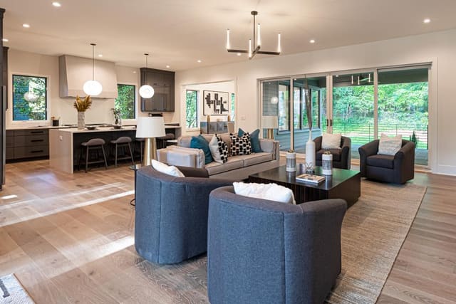 Staged living room overlooking the kitchen.