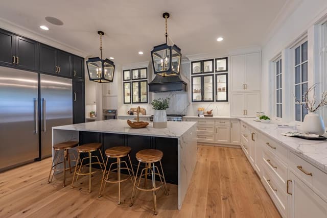 Kitchen of Raleigh home featuring black lantern pendants