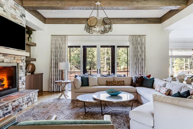 These custom linen window treatments frame these large doors beautifully.