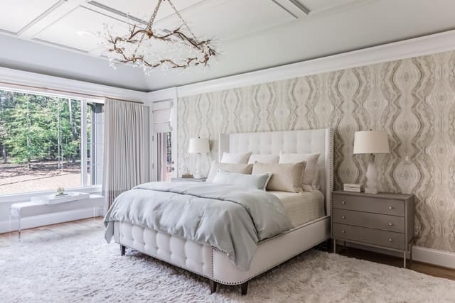 This Bedroom features a natural palette that is both soothing and glam with touches of crystal, lucite, and gold.