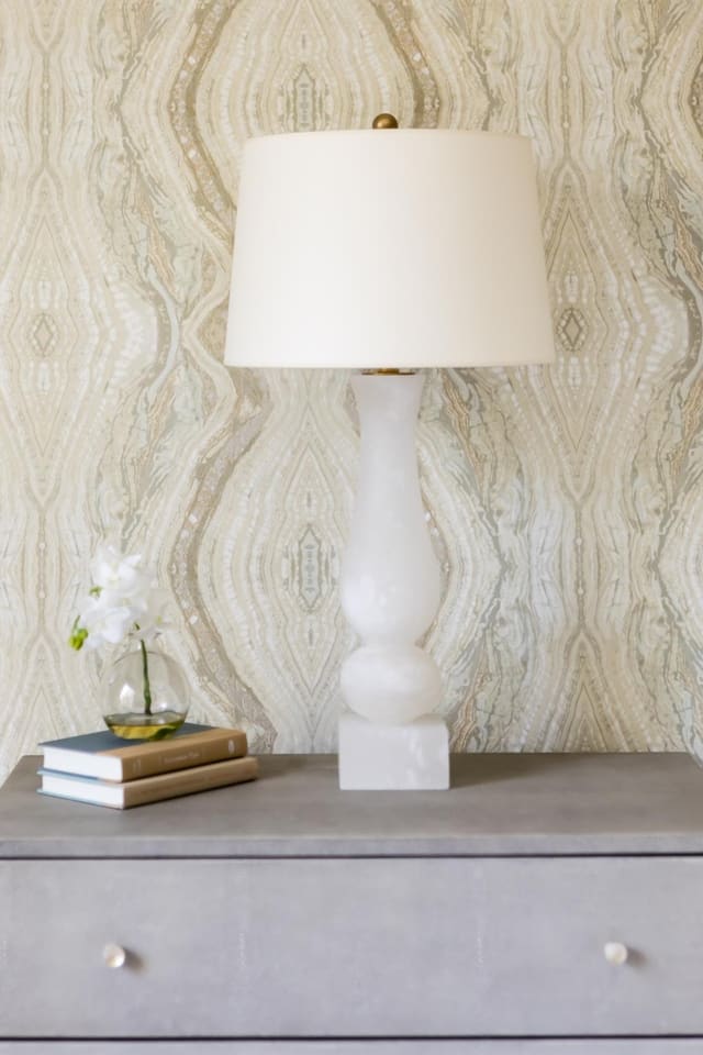 We love layering textures. This alabaster lamp, paired with the shagreen nightstand and the wallpaper background is dynamite.