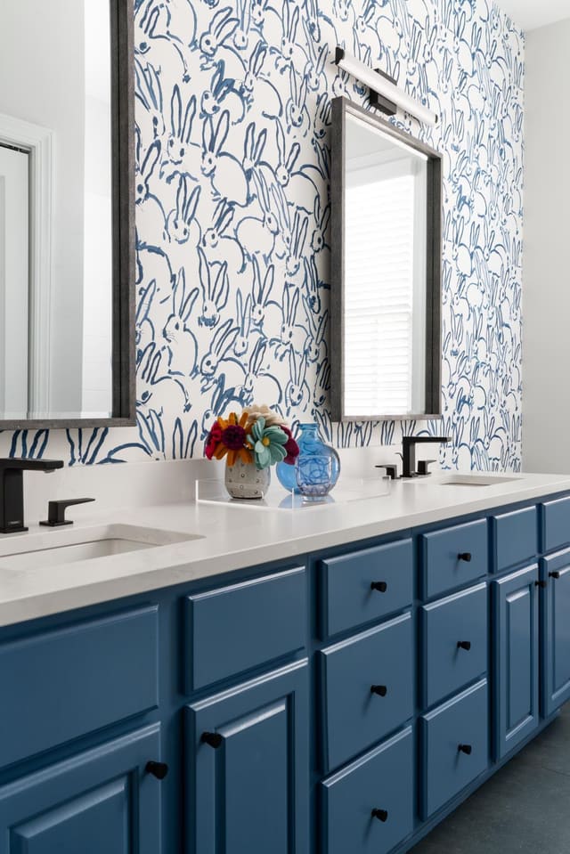 powder room with blue bunny wallpaper