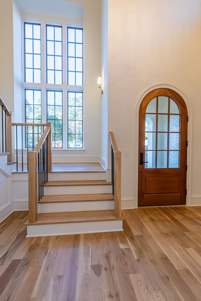 Foyer with arched door frame