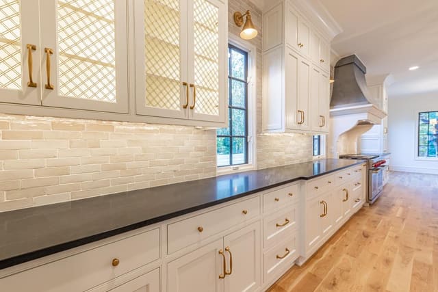 Cream-toned brick backsplash