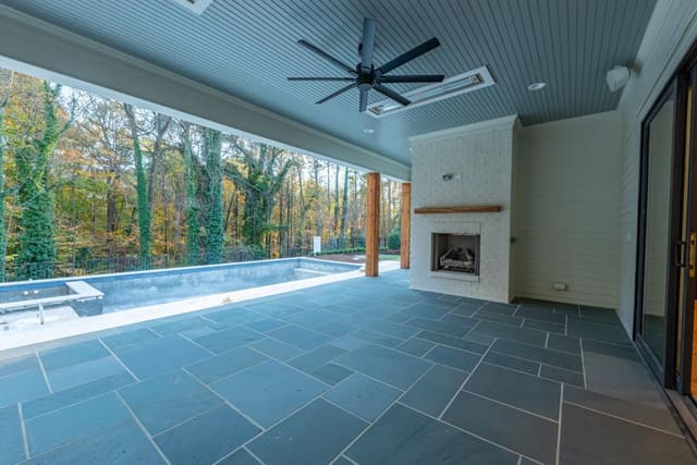 Outdoor area with built-in pool
