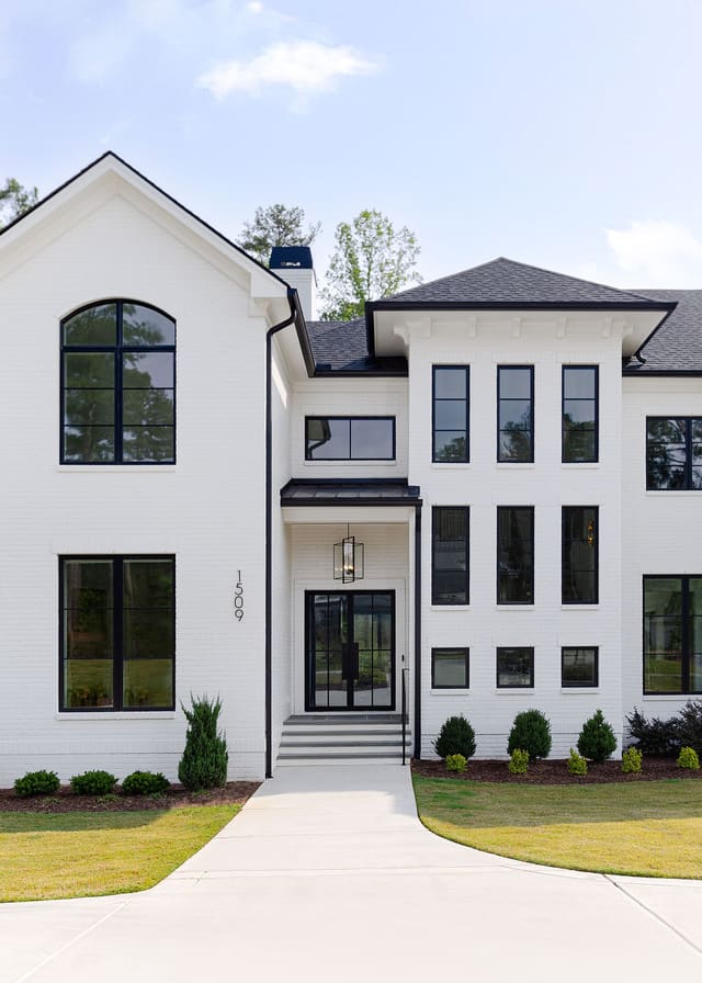 White brick exterior with black detail.