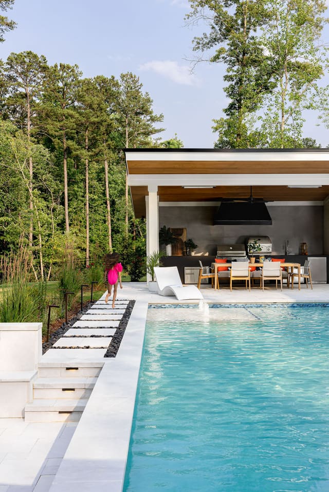 Pool leading into the outdoor grill area.