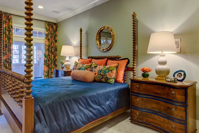 Master Bedroom with ornate bed, custom bedding and custmo chiang mai fabric window treatments