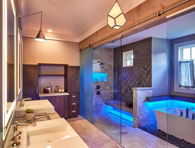 Master Bathroom with unique rock tub surround and LED lighting