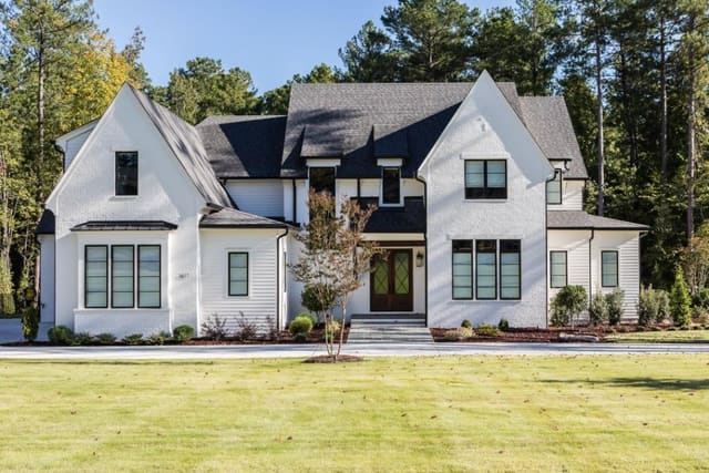 Exterior of home, white painted brick