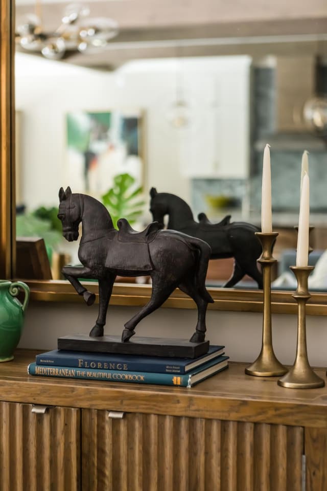 Close up of Family Room mantle with personalized accessories