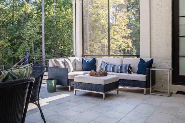 Back porch of N. Raleigh home with metal/wicker furniture