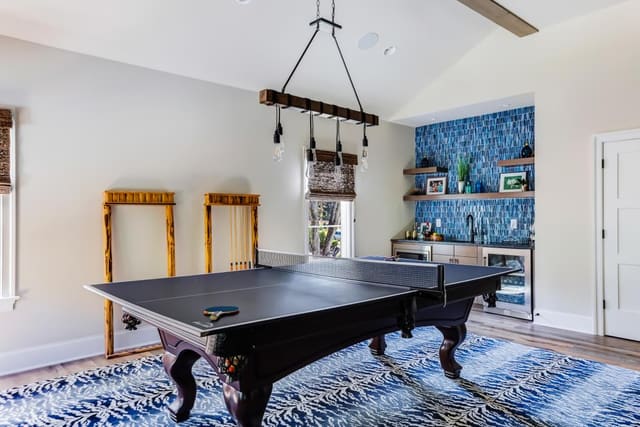 N. Raleigh Game Room with zebra patterned area rug