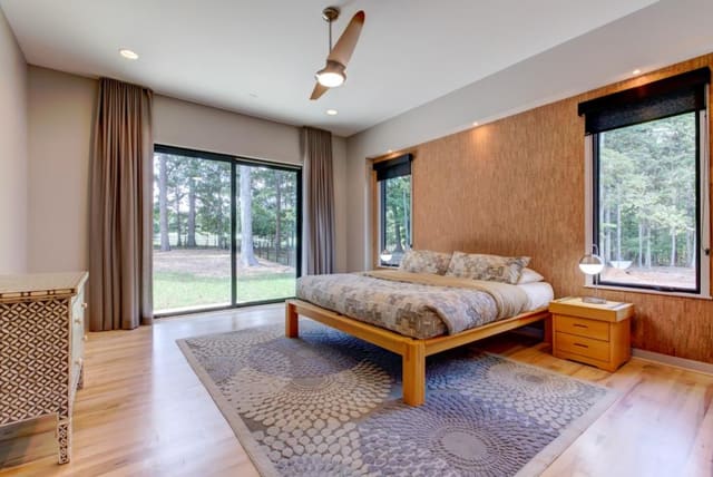 Master Bedroom with cork wallpaper and customer drapery panels