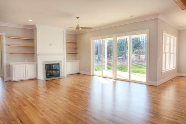 Family Room in North Raleigh home with floating bookshelves