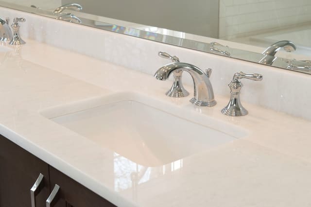 Close up of faucet and quartz countertop in Master Bathroom vanity