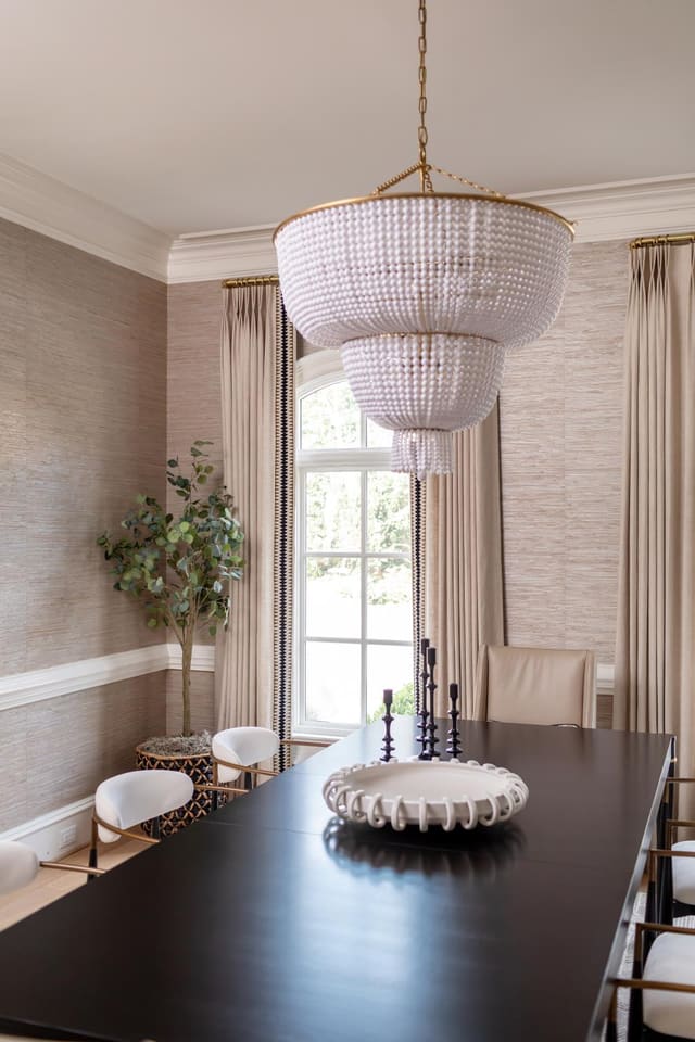 Dining room with chandelier.