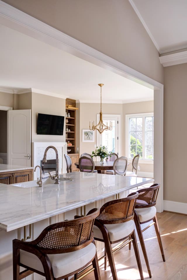 Three custom wooden barstools.